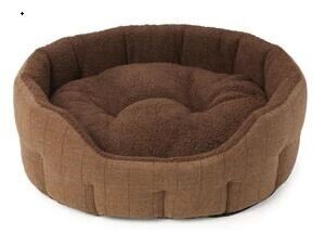 Brown tweed pet bed lined in soft faux sheepskin. House of Paws loves this beautiful tweed fabric it's soft and cosy. The bed features a water resistant non slip base.